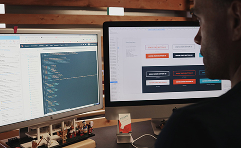 Man designing websites on computers
